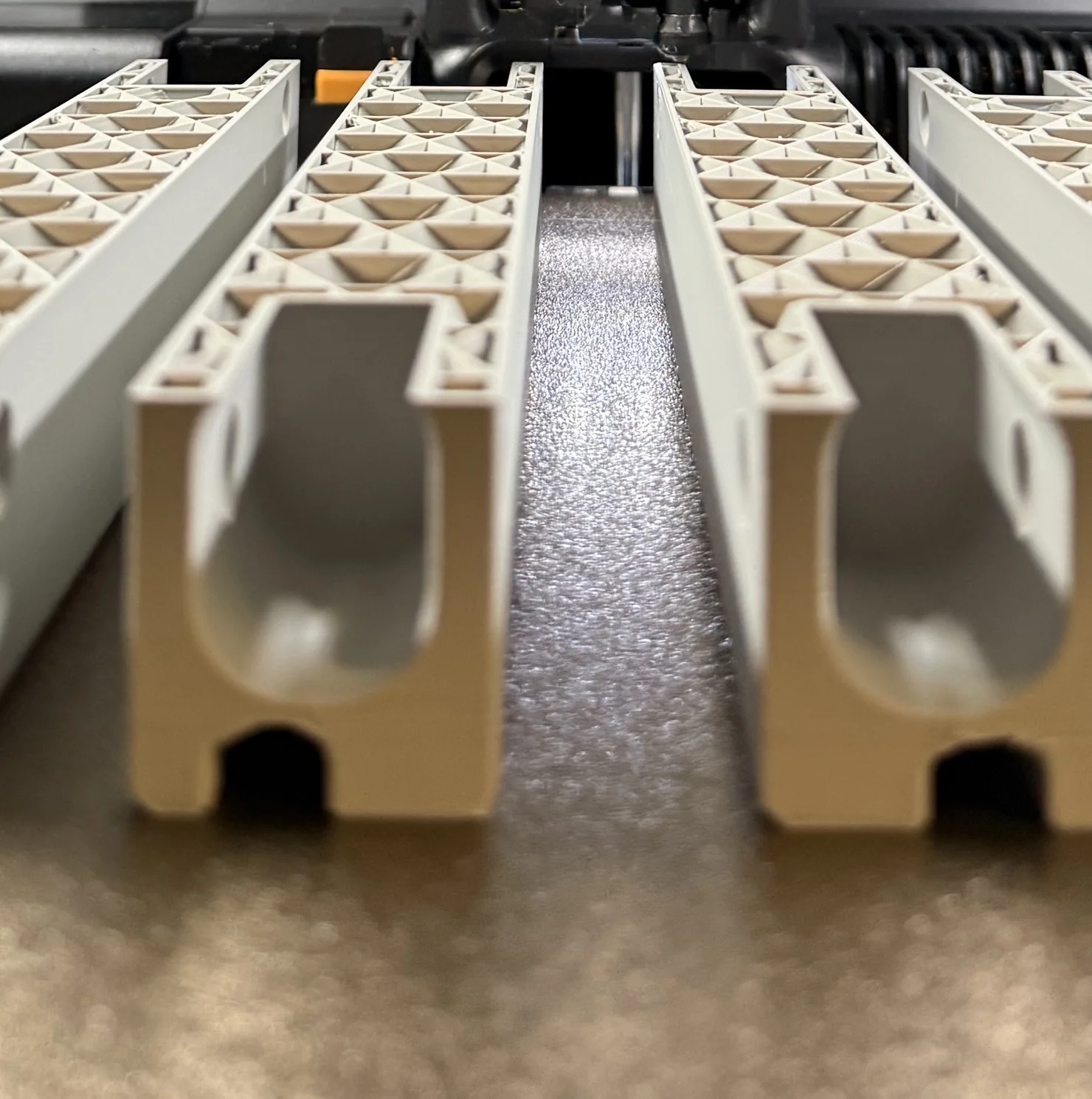 A matching set of functional parts arranged for production review at BAUMS