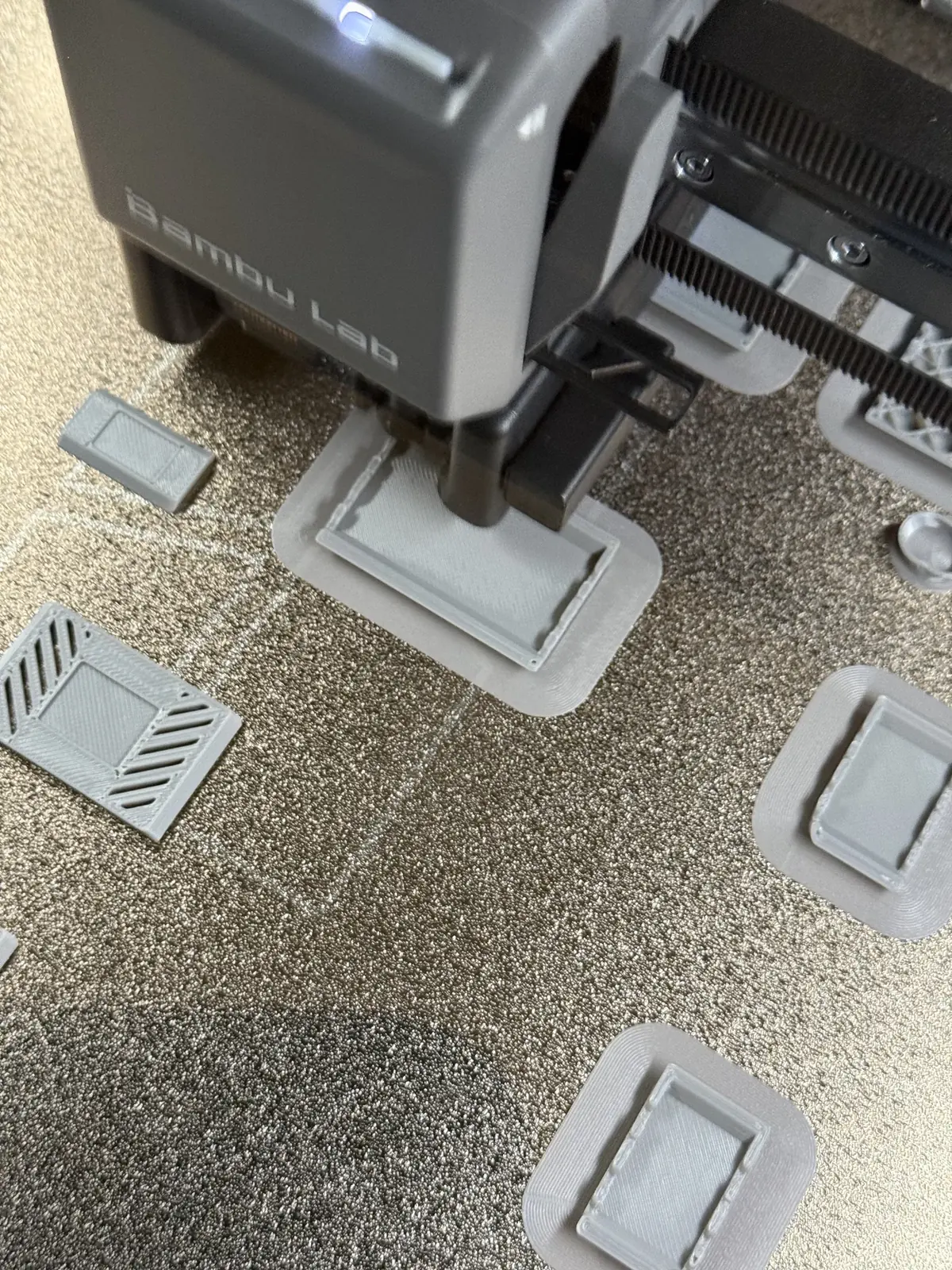 Prototype parts being evaluated during a BAUMS development workflow